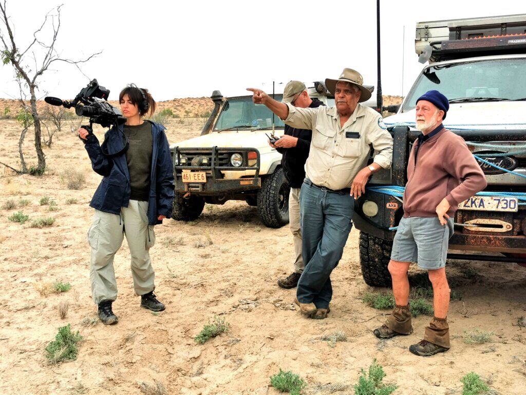 Don explains the situation to Russell, Gelareh and Martin (operating the drone)
