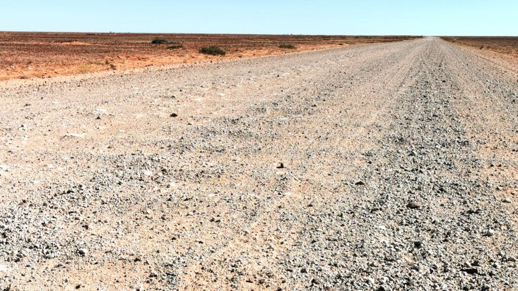 This was a horror surface to tackle all day. A hard washboard surface with loose stones