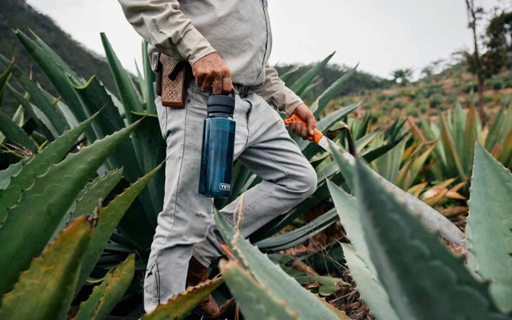 yeti yonder bottle carried by a farmer