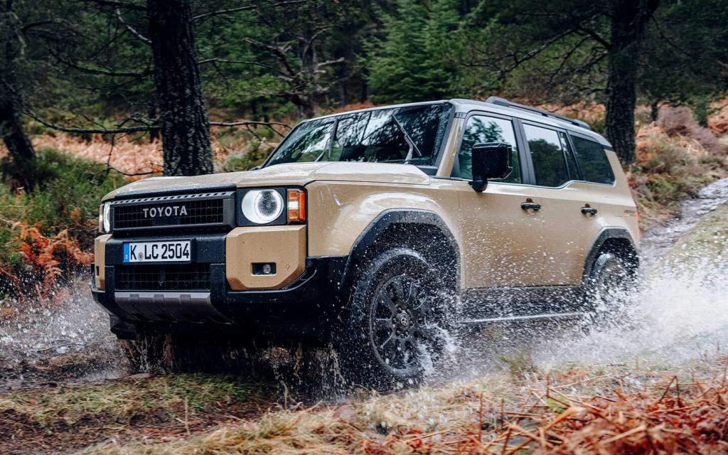 2024 land cruiser beige racing through a wet forest