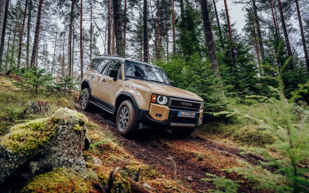 2024 land cruiser using crawl mode in a forest