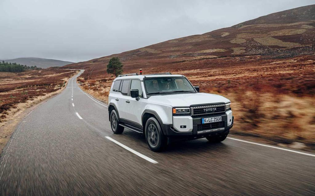 2024 land cruiser on a country road