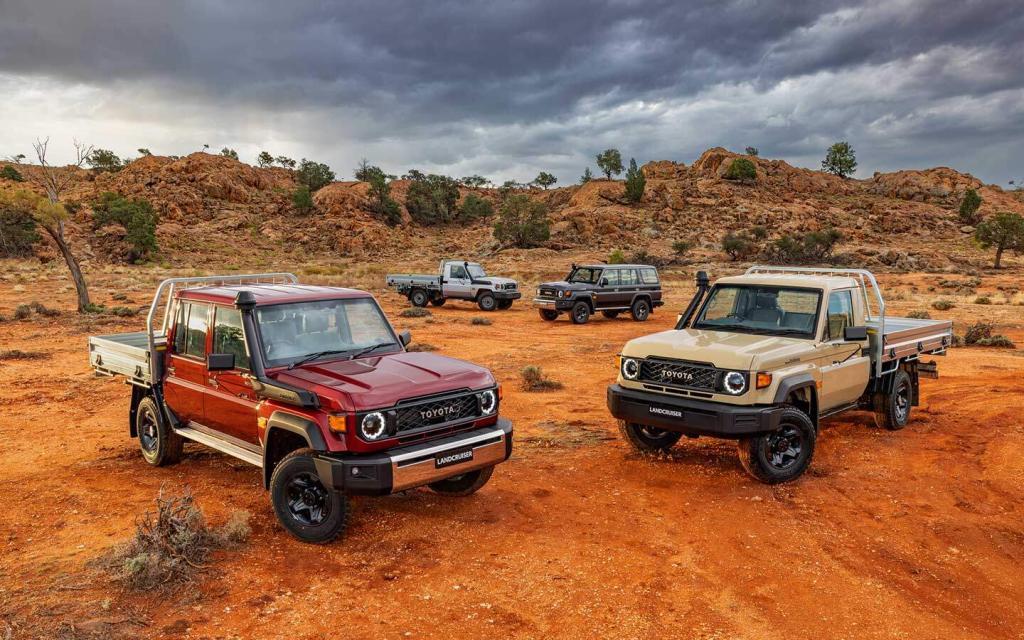 various models of the land cruiser 70 series in a desert setting