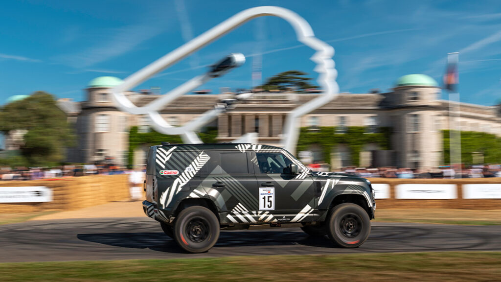 new defender powereing past the mansion at the goodwood festival of speed
