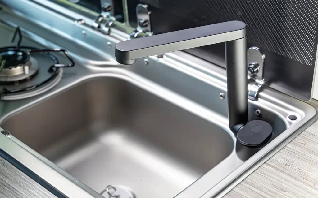 The stylish new black faucet in the kitchen