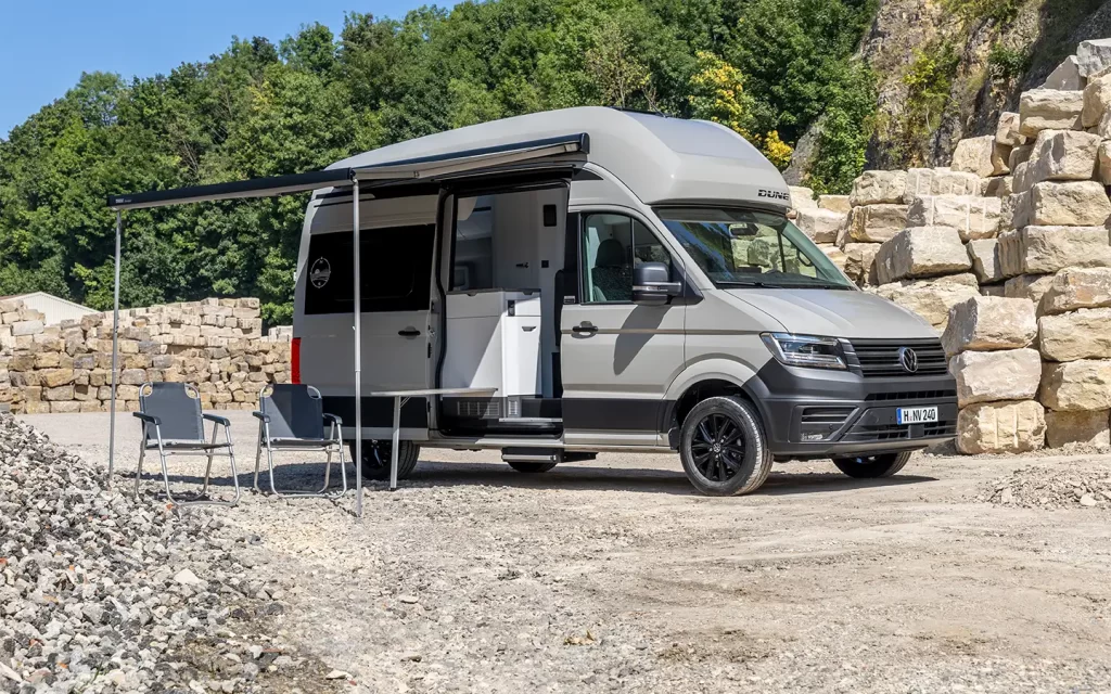 VW Grand California 680 wtih awning and camping furniture