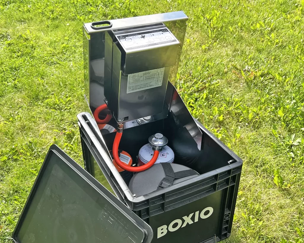 boxio cook with hob lifted to show gas canisters and storage space