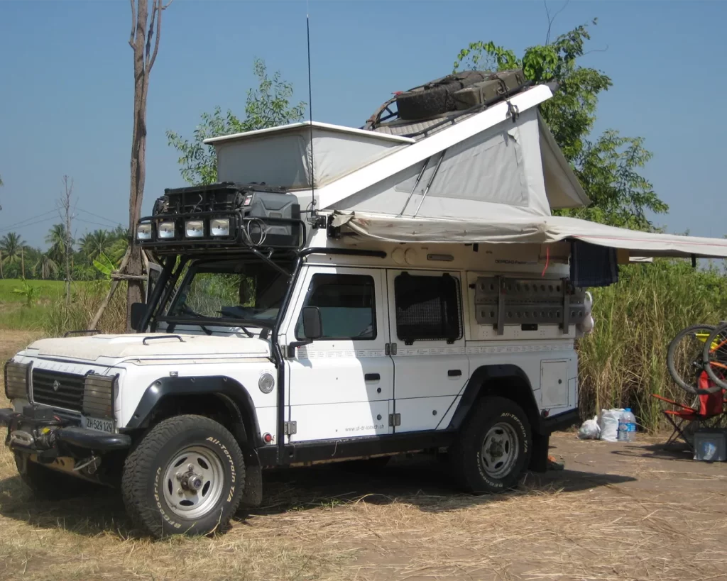 sanata in full camp mode with the rooftent set up and awning out